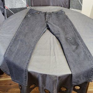 Levi’s black 501 93 manufacture distressed jeans, size 34
